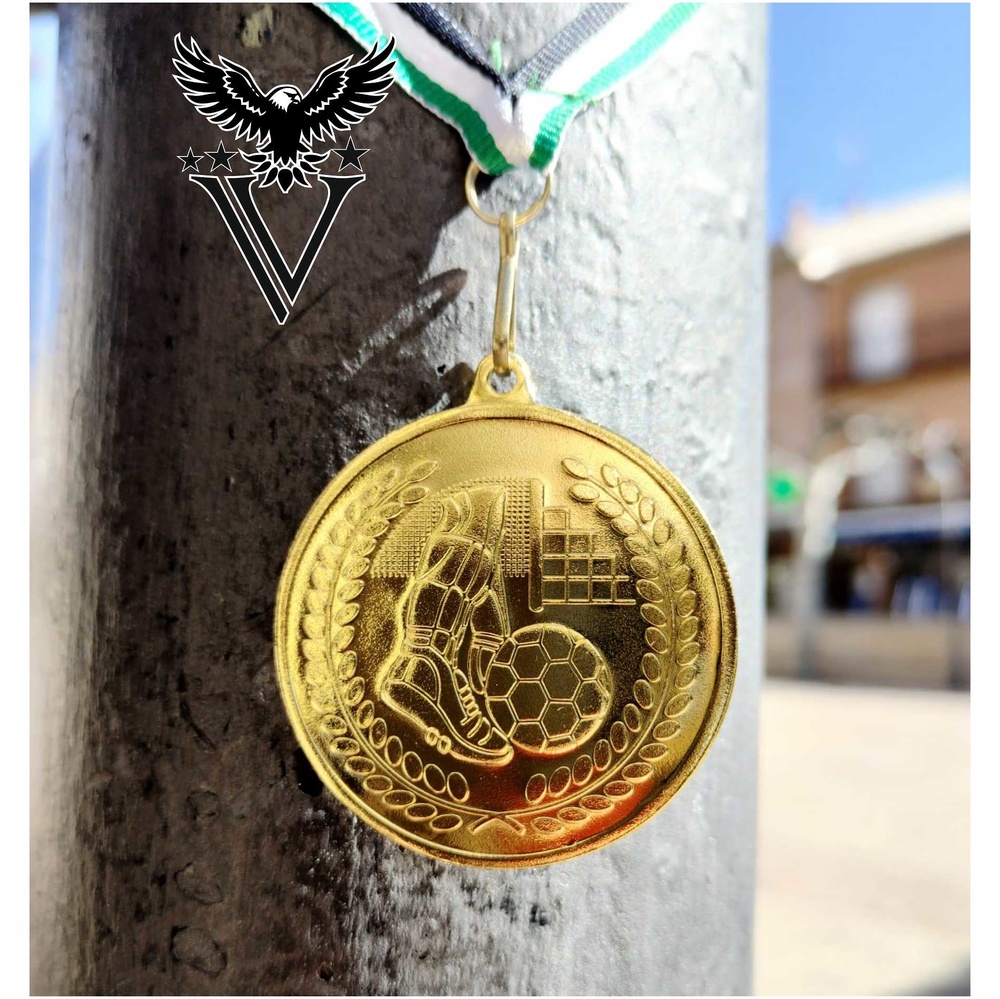 Medalla metálica para fútbol con relieve Hasta 300 unidades Oro 50 mm Ø Oro + de 300 unidades 50 mm Ø 
