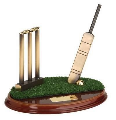 Trofeo críquet bate, stumps y bails 