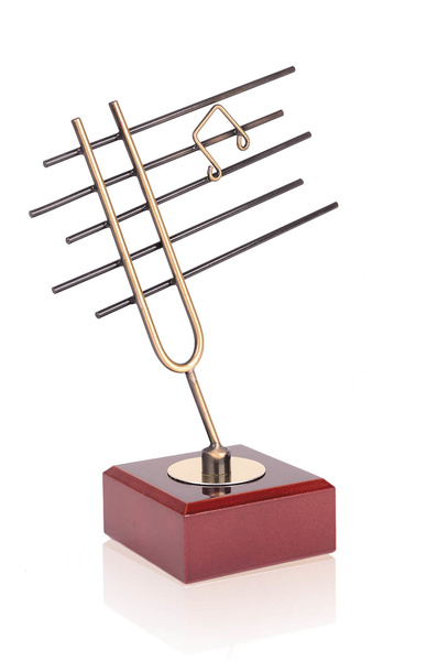 Trofeo musica de partitura y diapason 